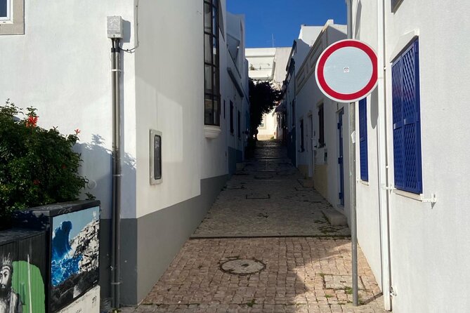 Albufeira History Walking Tour with Wine and Tapas - Cheese, charcuterie, fish cakes, and wine