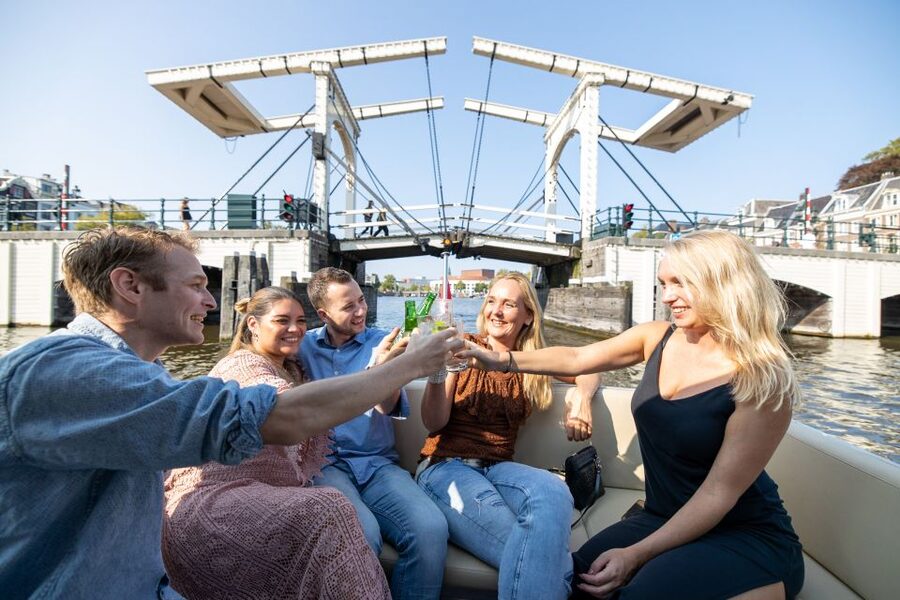 Amsterdam: Historic Boat Cruise with open bar and nibbles - Open bar, snacks, and the real value of $69