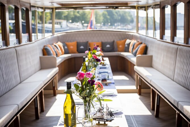 Amsterdam Historic Tour On Classic Saloon Boat - A One-Hour Introduction to Amsterdam by Water