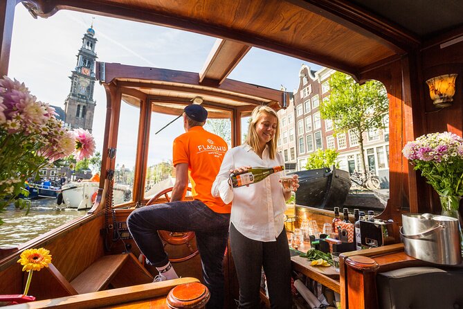 Amsterdam Historic Tour On Classic Saloon Boat - Live Commentary, Personal Tips, and Crew Style