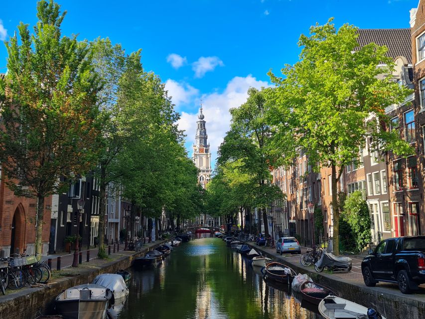 Amsterdam: Private Pedicab Historical Sightseeing Tour - Montelbaanstoren and the houseboats along Oude Waal