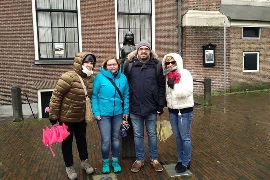 Amsterdam: Walking Tour of Historic Center - Nieuwmarkt, market traditions, and nightlife