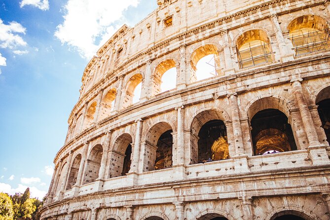 Ancient Rome Discovery: Colosseum, Forum, Palatine Guided Tour - Entering the Colosseum and reaching the first tier