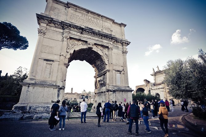 Ancient Rome Guided Tour: Colosseum, Forum and Palatine & Pick Up - Entering the Colosseum with the main admission handled