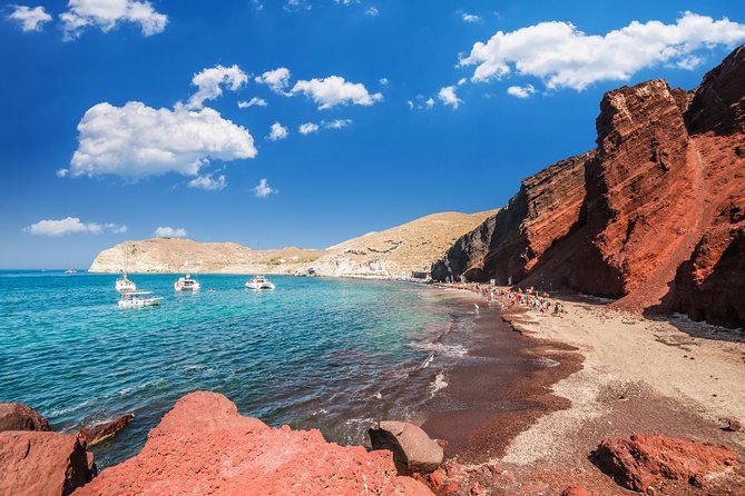 Archaeological Bus Tour To Akrotiri Excavations & Red Beach - Red Beach from above, with choices at Akrotiri Bay