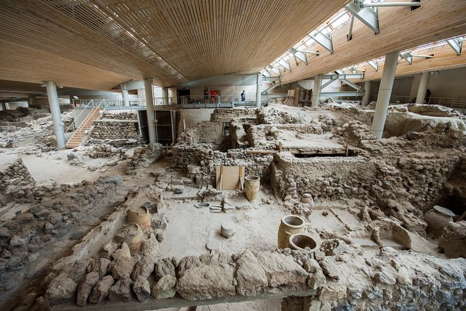 Archaeological Bus Tour To Akrotiri Excavations & Red Beach - Swimming at the black-sand beach