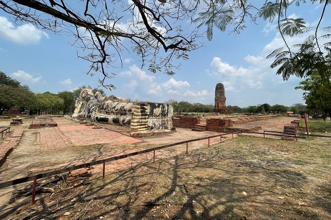 Ayutthaya Historical Old Capital day Tour from Bangkok - Wat Mahathat and the Buddha Head in the Roots
