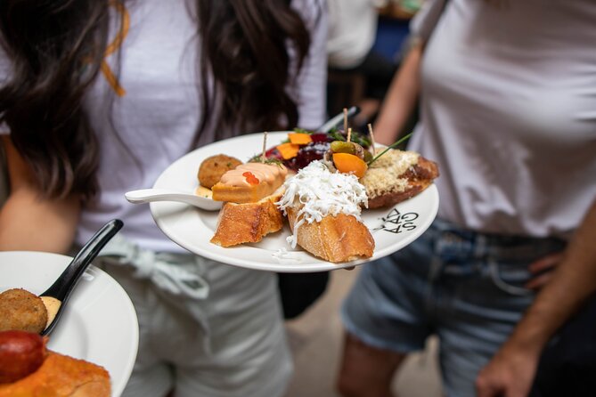 Barcelona Tapas Food Tour, Taverns, History & Local Culture - Guide style and the role of the group