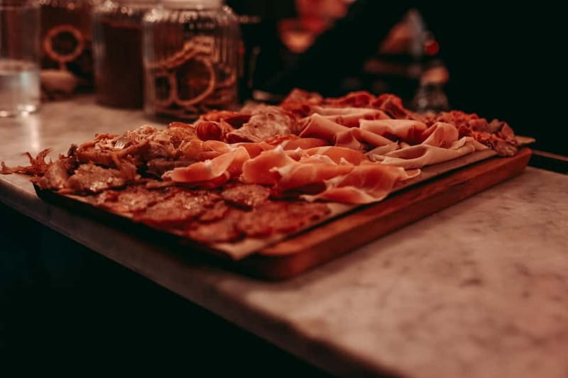 Barcelona: Tipsy Tapas & History Tour in the Gothic Quarter - Second Stop: Color, Croquettes, and Sea-Style Tapas