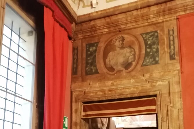 Bologna historical art walking tour with hidden gems and tastings - Towers, canals, and wooden building details