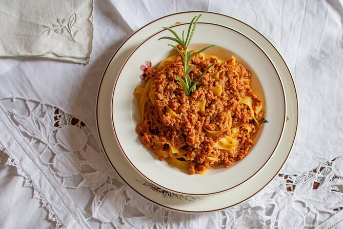 Bolognese Cooking Class with Margherita in the Historic Center - Making dough, shaping pasta, and cooking sauce