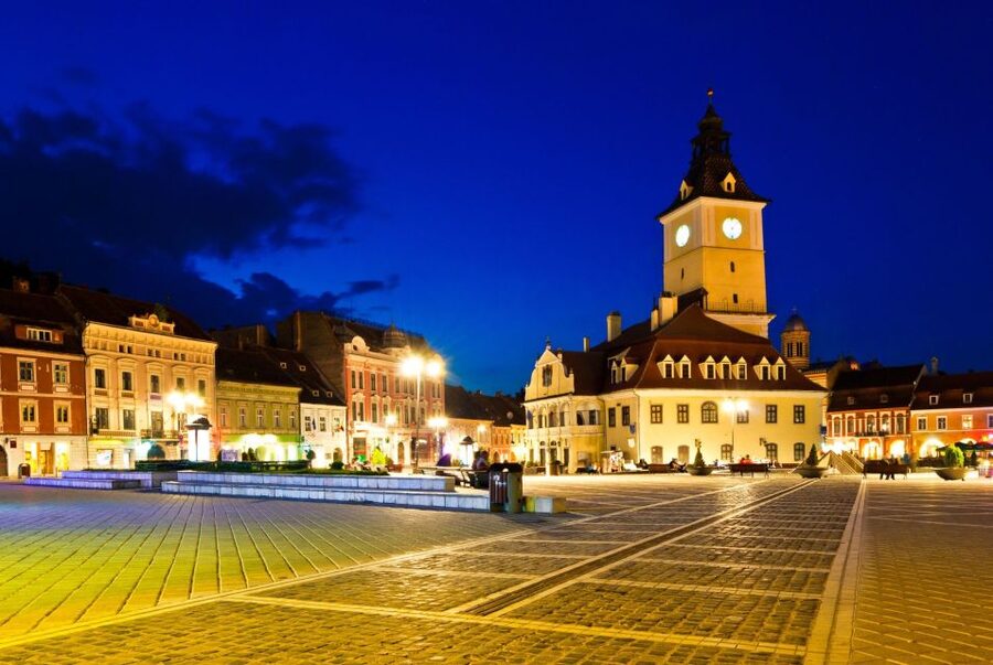 Brasov: Candlelight Tour of Medieval Architecture - The Black Church and the city after sunset