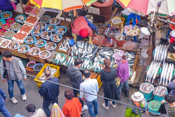 Busan history and market food tour with local chef - Bupyeong Kkangtong Market after dark