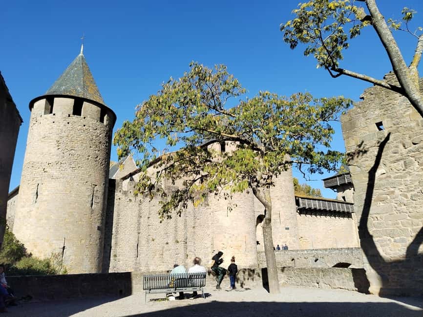 Carcassonne: Private Guided Tour of the Medieval Fortress - Adding Château Comtal and the ramparts