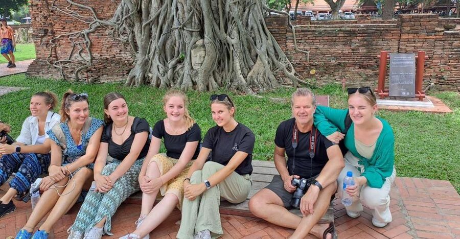 Colors of Ayutthaya: UNESCO Heritage 6 hour Bicycle Tour - Wat Mahathat and the Buddha head in the roots