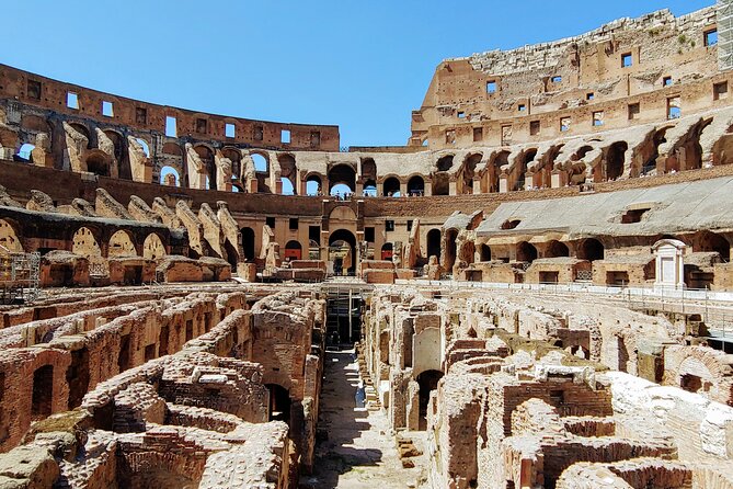 Colosseum & Ancient Rome Guided Walking Tour - Entering the Colosseum with a guide