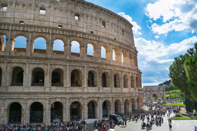 Colosseum Express Guided Tour and Ancient Rome Admission Included - Heat, crowds, and the real pace of the tour