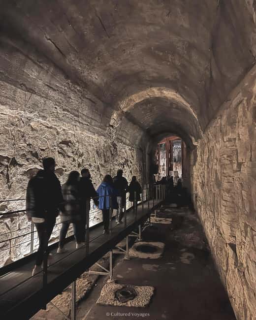 Colosseum Special Access Tour, with Ancient Temples & Tombs - Entering through the Colosseum’s Gladiators’ Gate