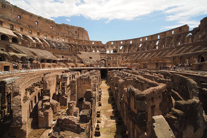Colosseum Underground & Ancient Rome Guided Tour - Entering the Colosseum and reaching the arena floor