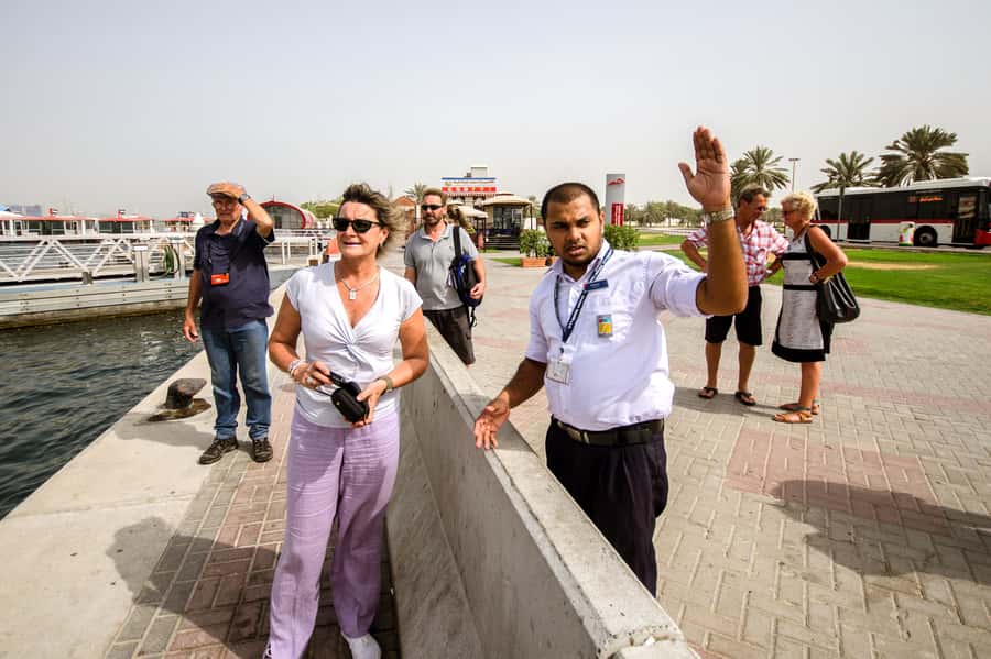 Dubai: Historic City Highlights Day Trip - Languages, clothing, and timing