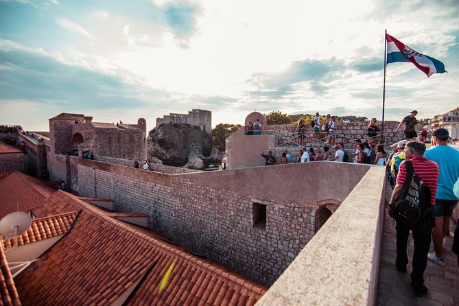 Dubrovnik: Ancient City Walls & Wars Walking Tour - Heat, stairs, and the best time to go
