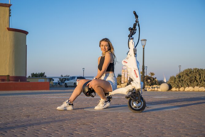 Explore the Medieval city of Rhodes on scooters - 2 hours - What the guide adds
