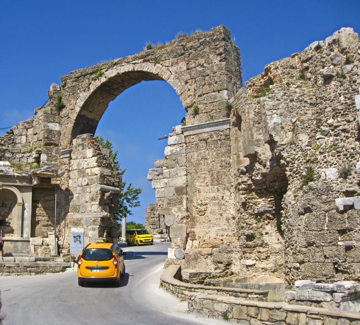 From Antalya: Roman Ancient Sites & Manavgat Waterfall Tour - Side: ruins beside the Mediterranean