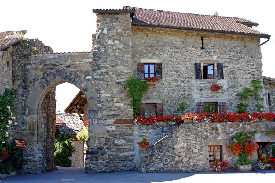 From Geneva: Yvoire medieval village & Lake Geneva Cruise - The Garden of the Five Senses costs extra