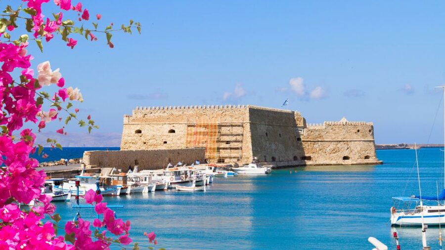 From Heraklion: Historical Center City Tour & Knossos Palace - Walking into the Palace of Knossos