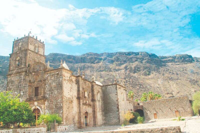 From Loreto: Historical San Javier Mission Tour with Lunch - The mountain road into La Giganta