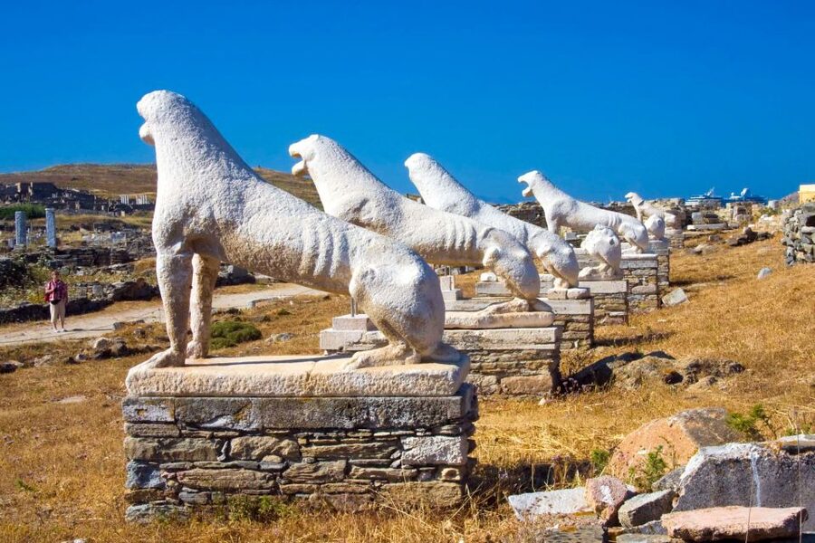 From Mykonos: Delos Archaeological Site Guided Evening Tour - Walking into the sacred center of Delos