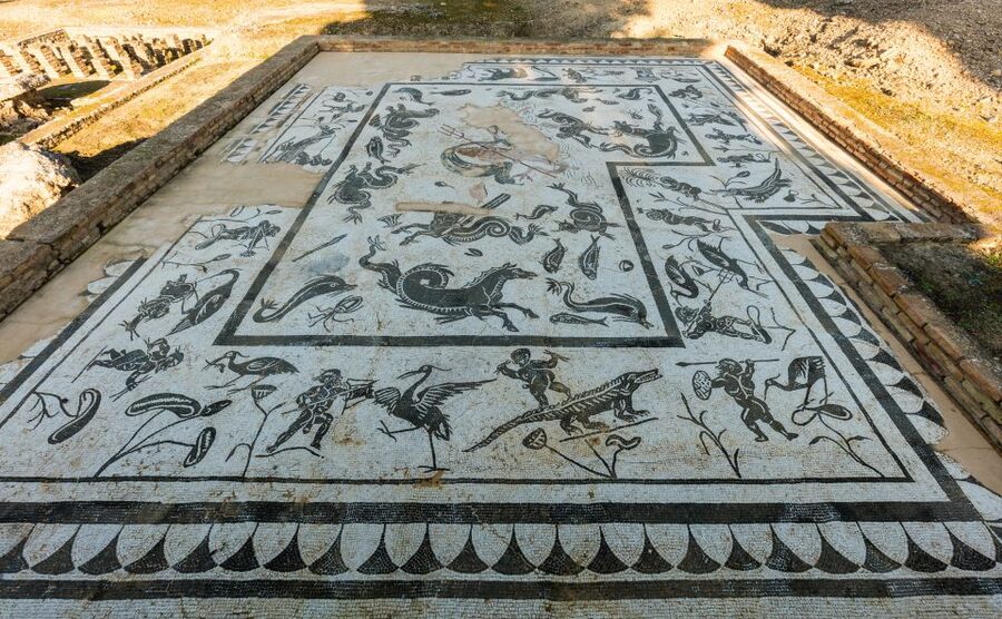From Seville: Italica Roman City & Medieval Monastery Tour - The 20-minute coach ride from Seville