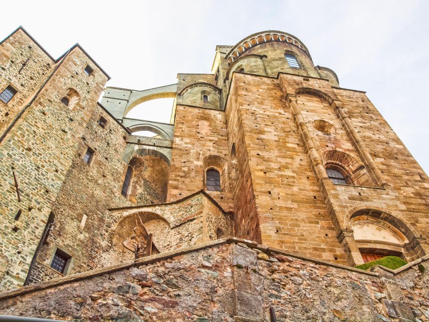 From Turin: Half-Day Medieval Sacra di San Michele Tour - The Doorway of the Zodiac and its carved figures