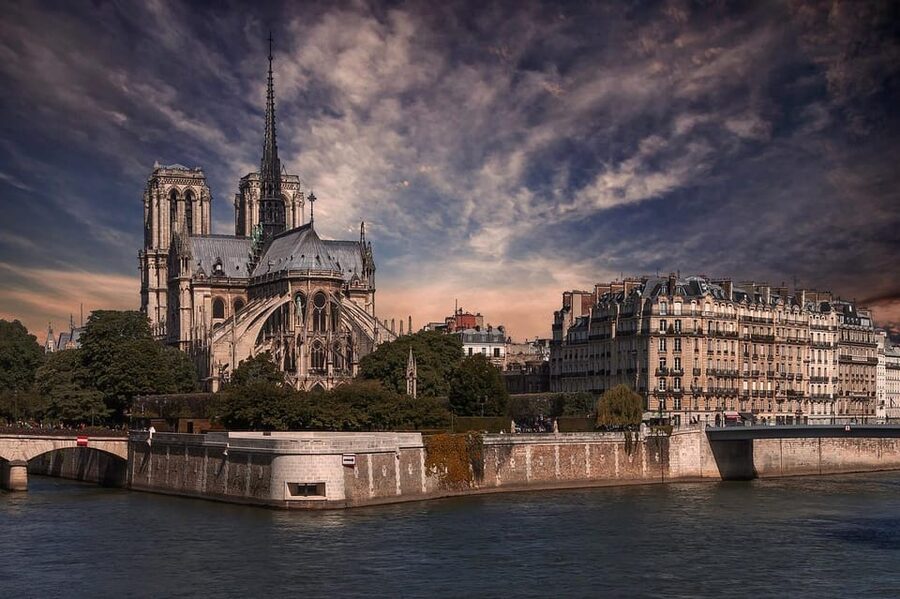 Historic Paris Walking Tour in English - The Louvre as palace, museum, and political symbol