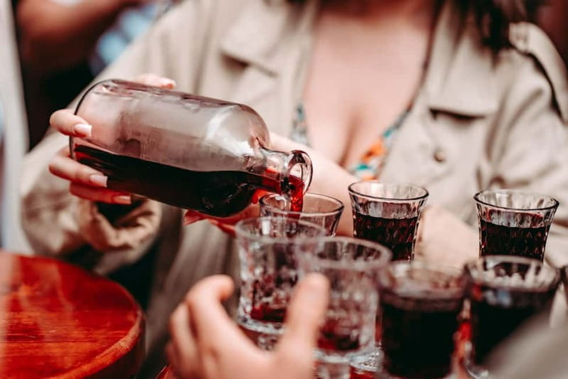 Krakow: Tipsy Polish Food Tour With History, Pierogi & Shots - Cherry liqueur and Polish shots