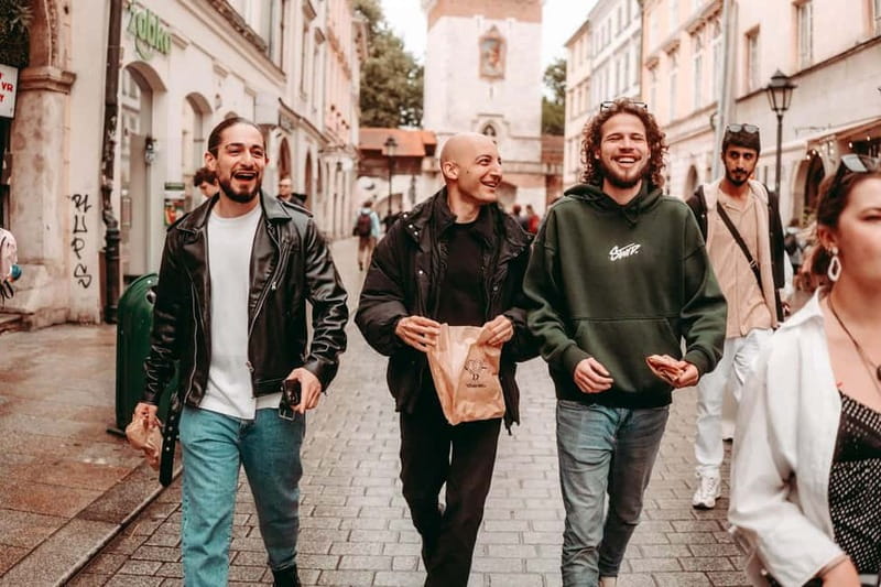 Krakow: Tipsy Polish Food Tour With History, Pierogi & Shots - Starting with a pretzel and a taste of Poland