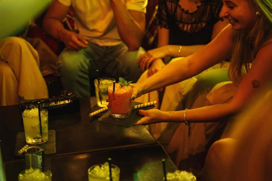 Lisbon: Private Dark History Walking Tour with Drinks - Moving through several bars