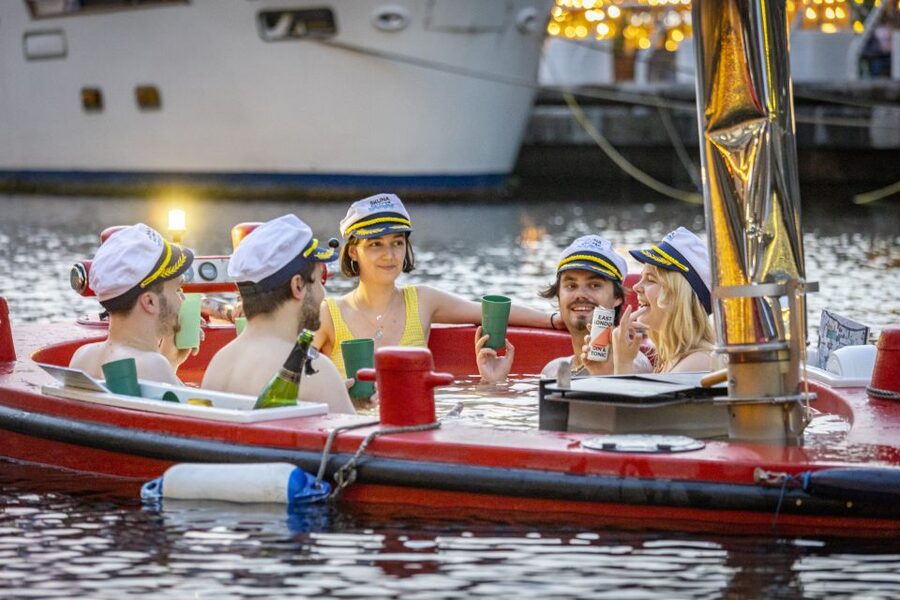 London: Hot Tub Boat Guided Historical Docklands Cruise - Settling into the heated floating tub