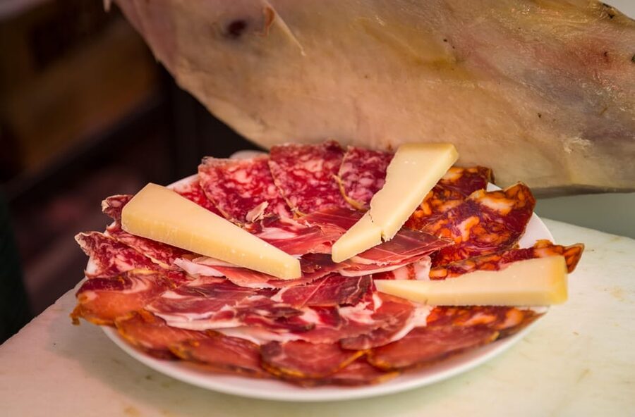 Madrid: Authentic Tapas Evening Tour with a side of History - Plaza Isabel II and the old quarter