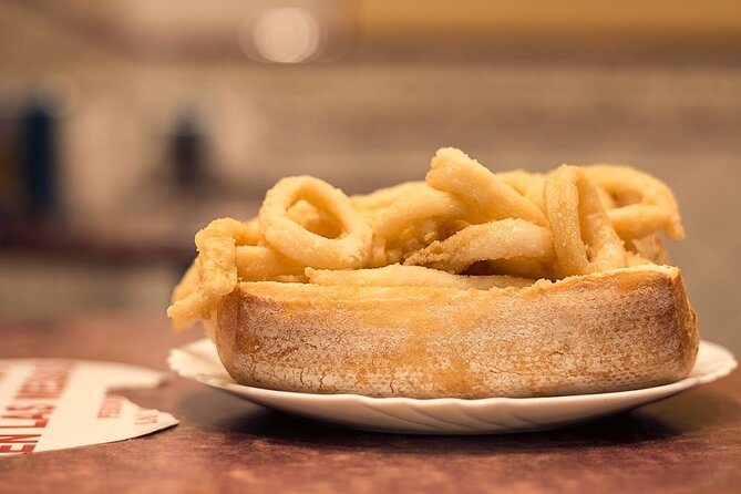 Madrid Historic Centre Food Tour with Authentic Tapas & Wines - The squid sandwich is Madrid’s unapologetic classic