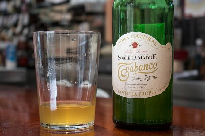 Madrid Historic Centre Food Tour with Authentic Tapas & Wines - Tapas, cider, and vermouth keep the route local