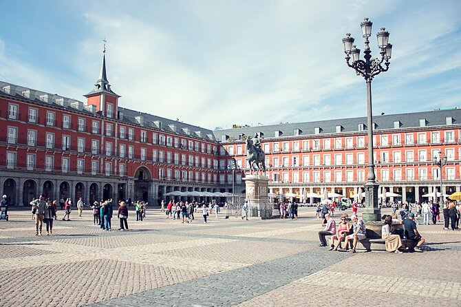 Madrid Historic Centre Food Tour with Authentic Tapas & Wines - The final restaurant serves tortilla and a secret dish