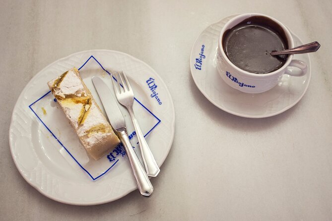 Madrid Historic Centre Food Tour with Authentic Tapas & Wines - The historic pastry shop starts things sweet