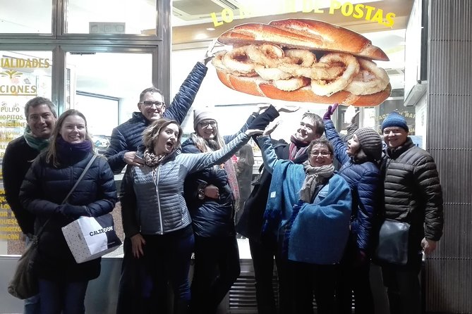 Madrid Local's Tapas Tour Dinner with a side of History - Plaza Mayor, ham, Manchego, and a well-poured beer