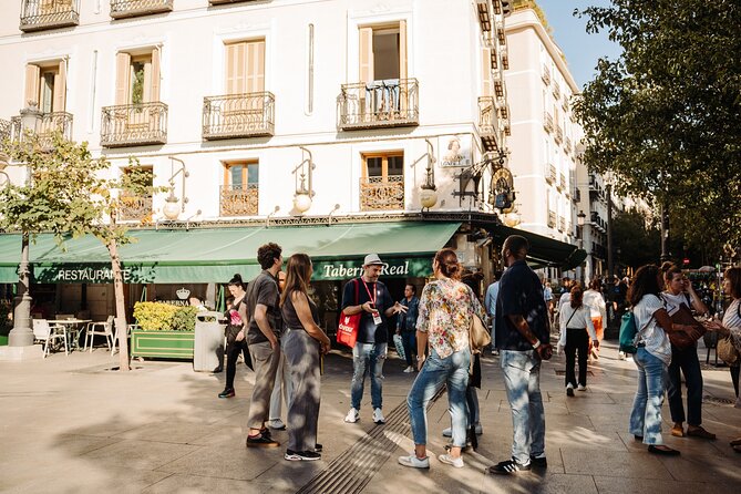 Madrid Tapas & Taverns Small Group Food & History Tour - The Royal Palace and Habsburg streets provide the pause