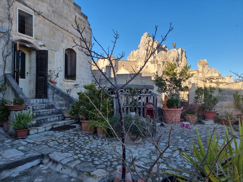 Matera: Sassi di Matera Historical Self-Guided Audio Tour - Caves used from the Neolithic period to modern times