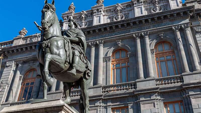 Mexico City: Historic Downtown Walking Tour - Meeting beneath the Zócalo’s white umbrellas