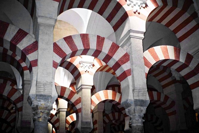 Mosque of Cordoba History Tour in English Tickets included - Inside the red-and-white arches