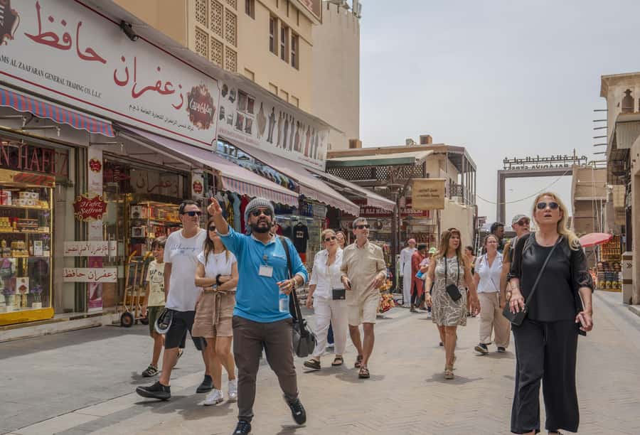 Old Dubai Historic Guided Tour: Creek, Street Food & Souks - Crossing Dubai Creek by traditional abra