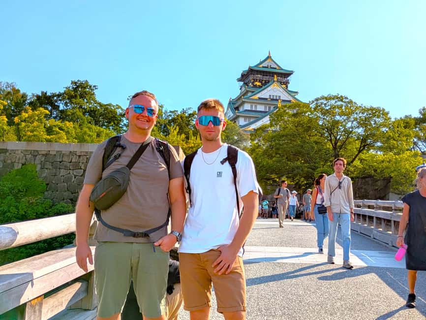 Osaka: Osaka Castle & Historical Museum Guided Tour - Walking through Osaka Castle Park